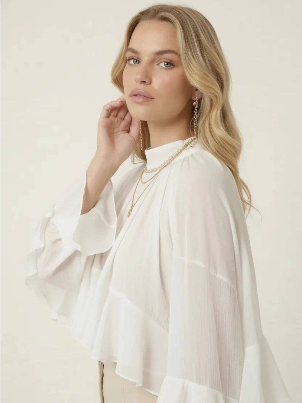 Modenaire Sheer Ruffle Sleeve Blouse with High Neck and Layered Hem White NWT